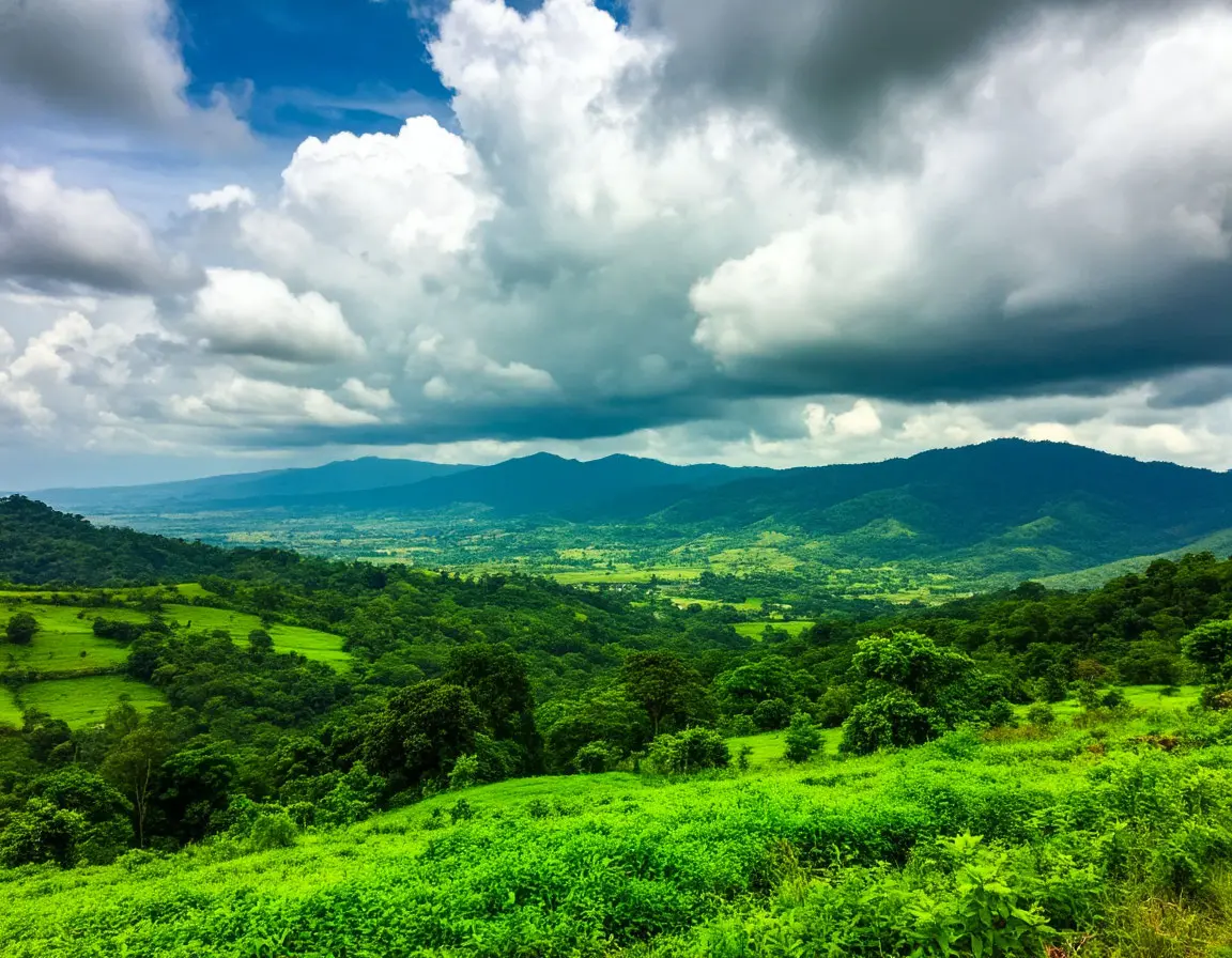 Green landscapes under rainy clouds with patchy sunshine